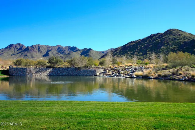 a view of a lake with a mountain in the background