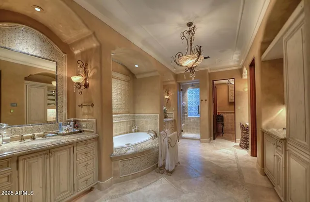 a bathroom with a granite countertop sink a toilet and shower