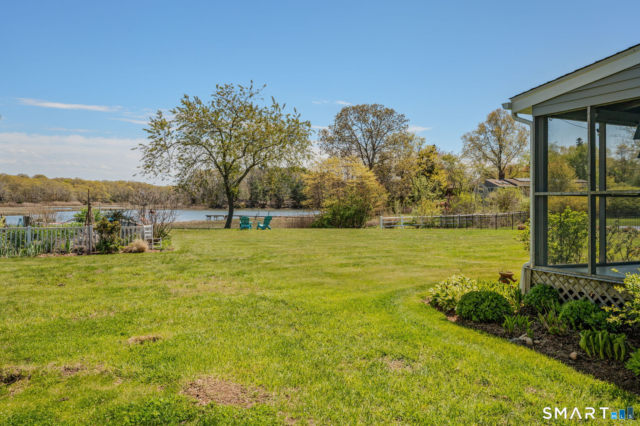 21 Hefflon Farm Road Old Lyme, CT 06371 - Photo 32 of 40 Screened porch views of backyard and water