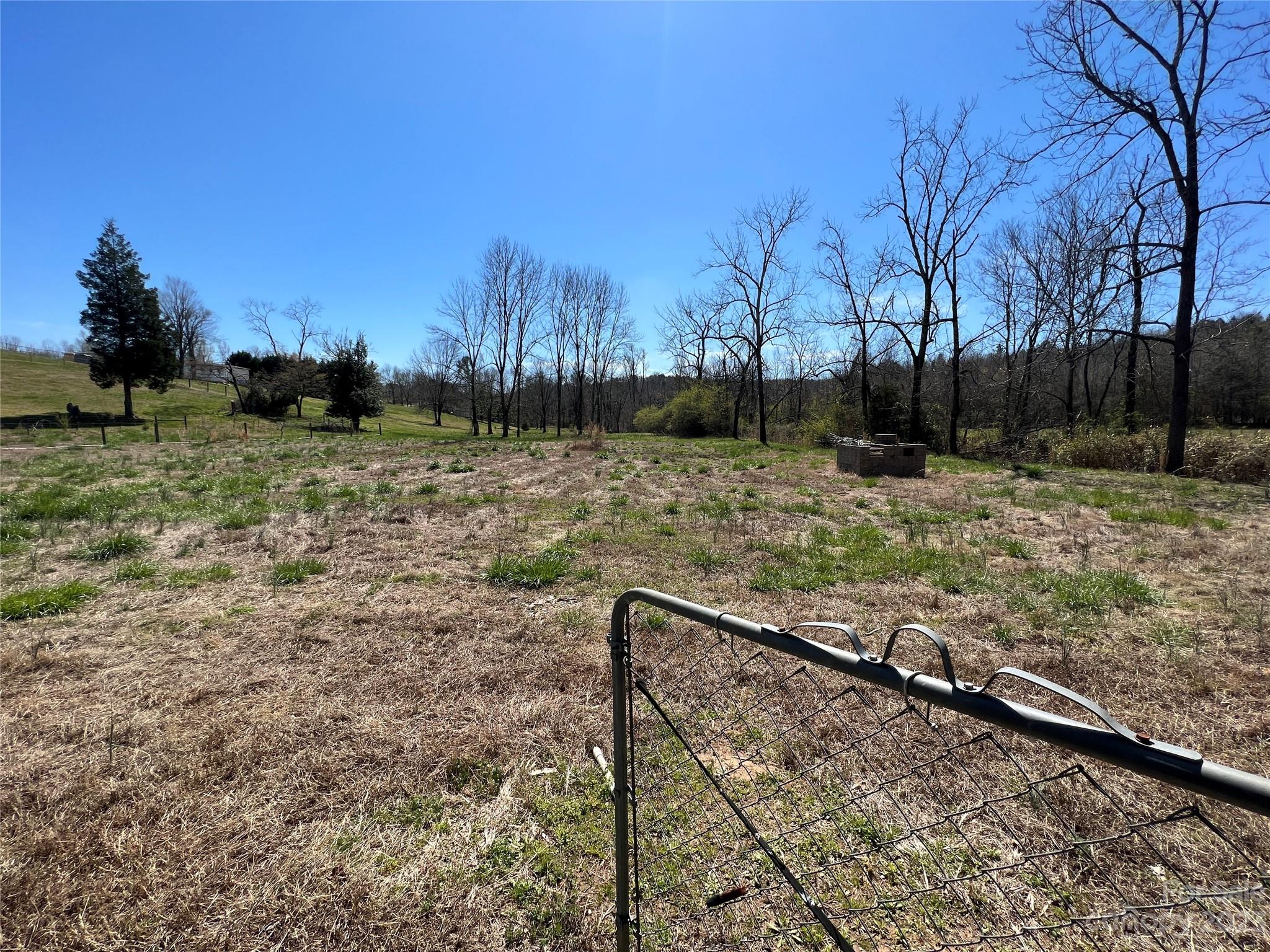 126 Burnt Chimney Road, Unit 39 Blacksburg, SC 29702 - Photo 4 of 14 a view of a yard with wooden fence