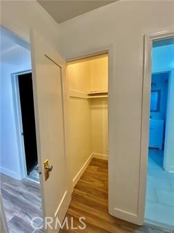314 Coronado Avenue, Unit C Long Beach, CA 90814 - Photo 11 of 19 a view of a hallway with wooden floor and a hallway