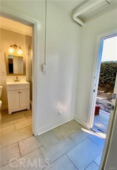 314 Coronado Avenue, Unit C Long Beach, CA 90814 - Photo 8 of 19 a bathroom with a sink and a mirror
