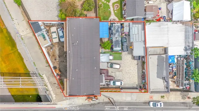 an aerial view of houses with outdoor space