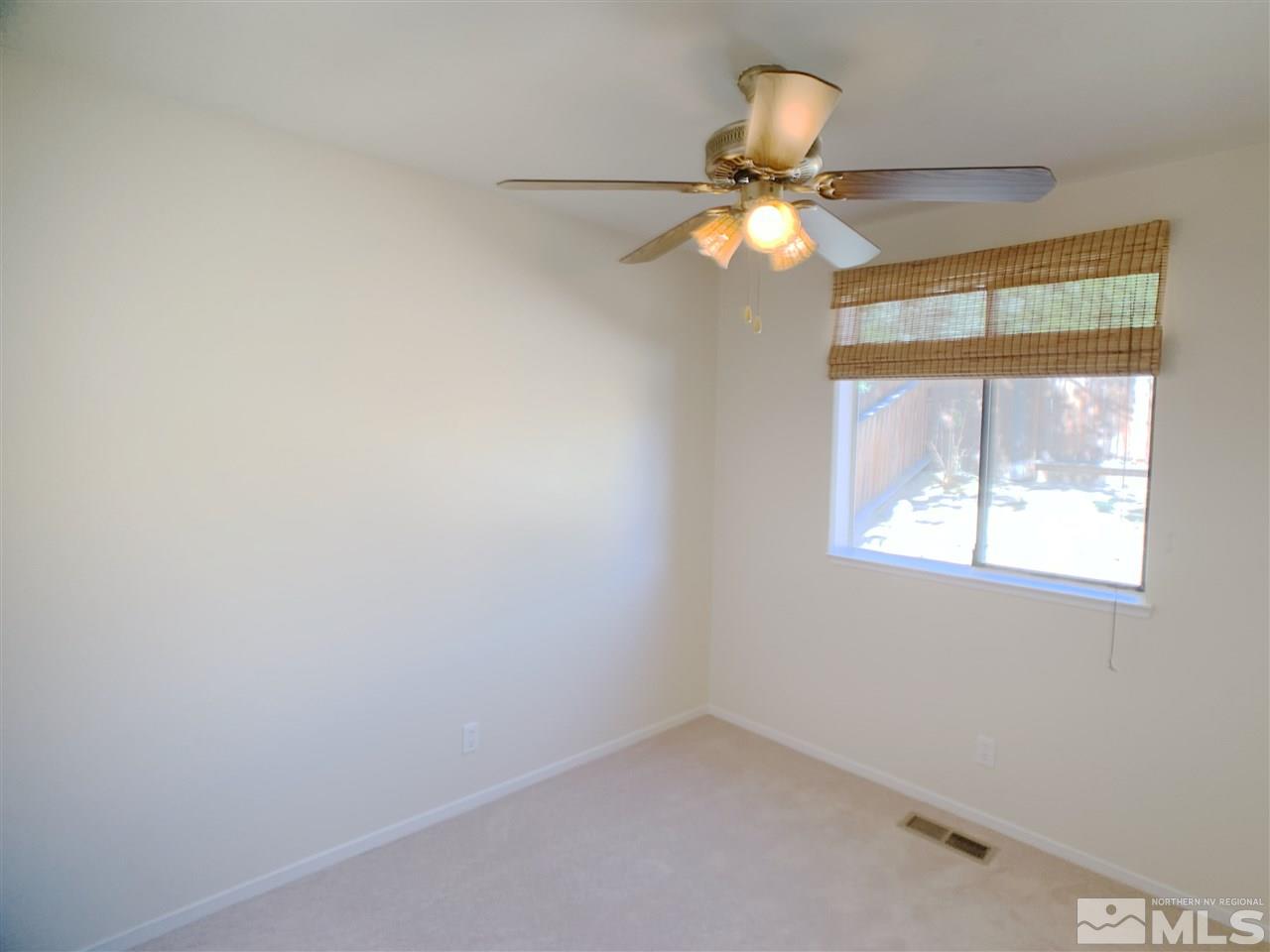 2101 Escalera Way Reno, NV 89523 - Photo 12 of 17 an empty room with a window