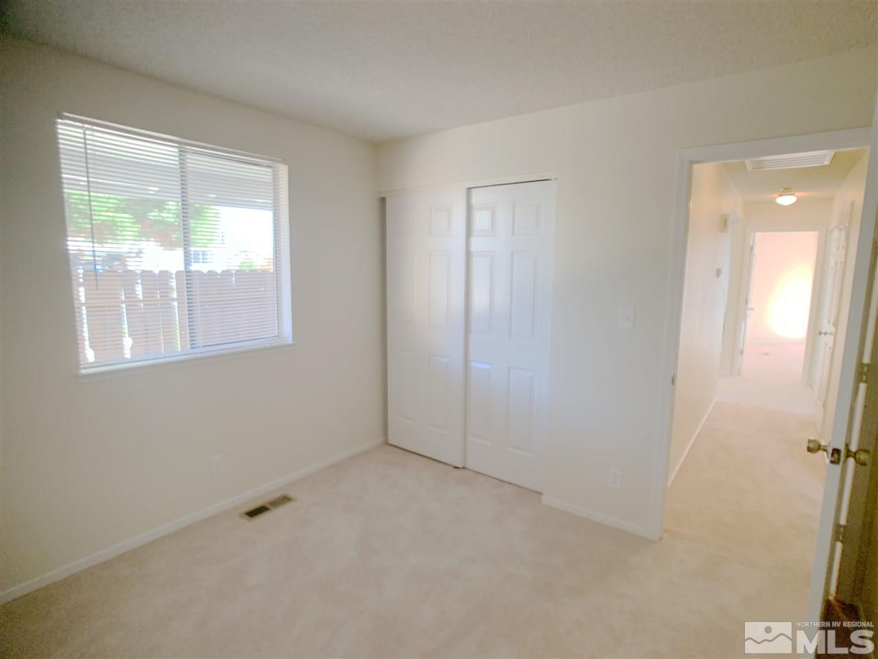 2101 Escalera Way Reno, NV 89523 - Photo 14 of 17 a view of an empty room with a window