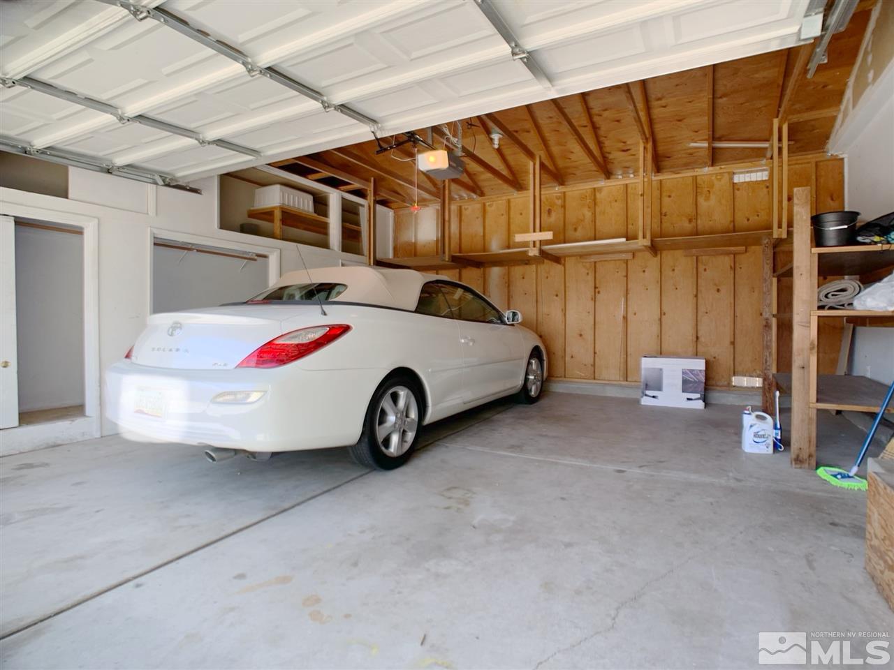 2101 Escalera Way Reno, NV 89523 - Photo 15 of 17 a car parked in front of a house