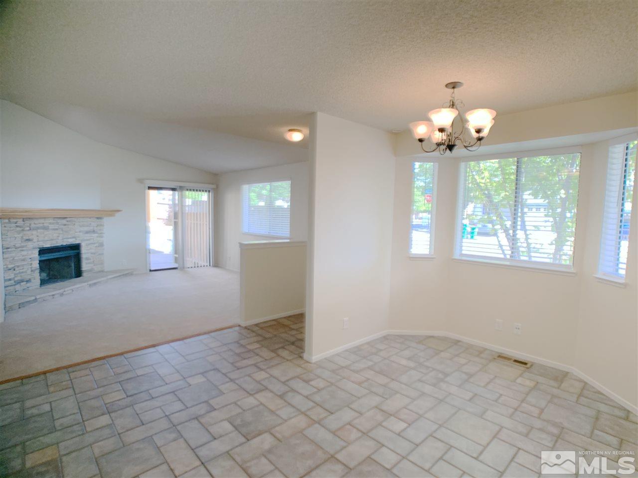 2101 Escalera Way Reno, NV 89523 - Photo 5 of 17 a view of an empty room with a window