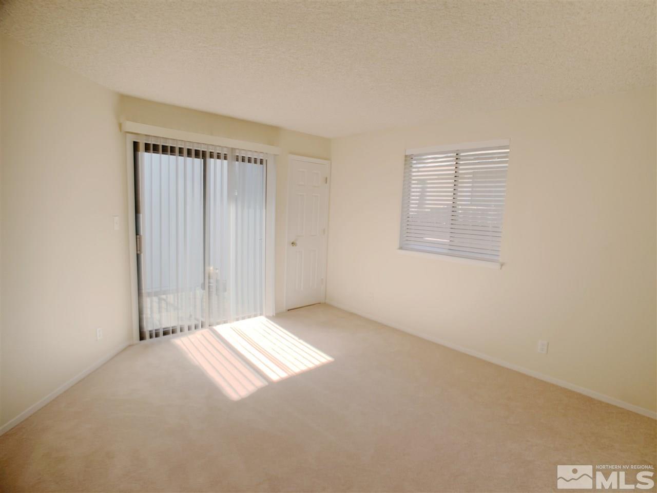 2101 Escalera Way Reno, NV 89523 - Photo 9 of 17 an empty room with windows