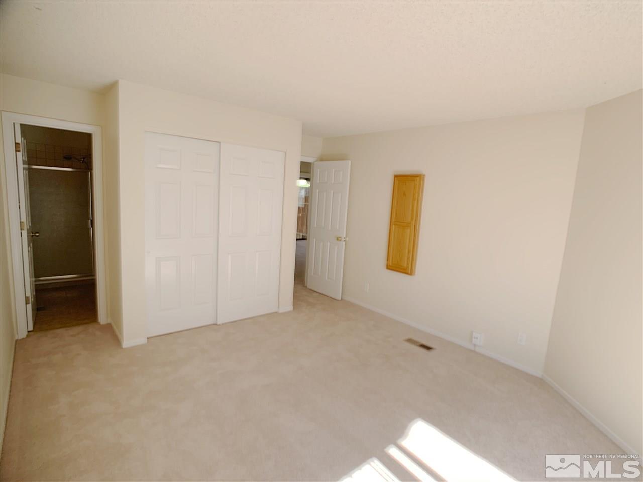 2101 Escalera Way Reno, NV 89523 - Photo 10 of 17 an empty room with windows and closet