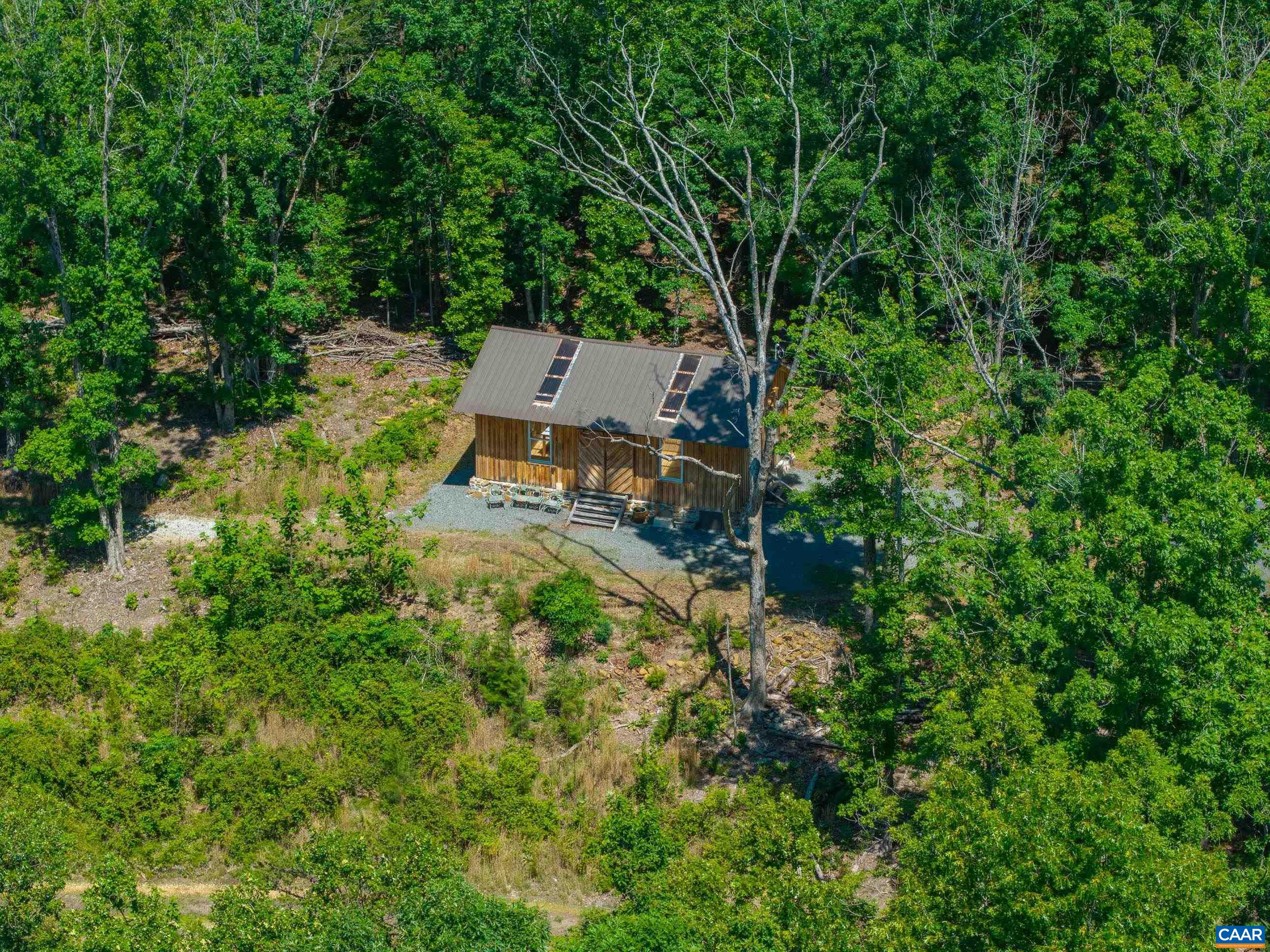 7676 Old Dominion Road Schuyler, VA 22969 - Photo 26 of 29 an aerial view of a house with a yard