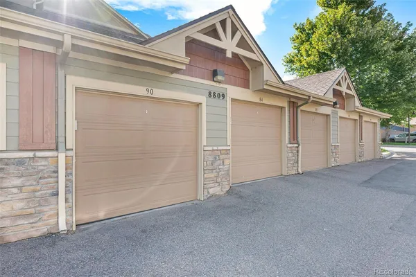 a view of a house with a garage