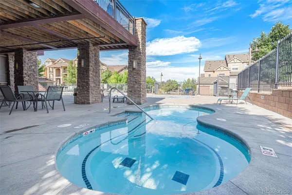 a view of a terrace with furniture