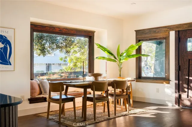 a kitchen with a sink and large window
