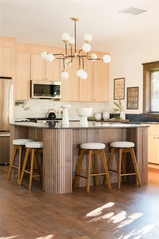 a view of a living room and dining room