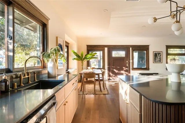 a bathroom with a bathtub sink and a window