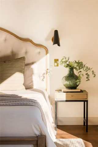 a bathroom with a granite countertop shower a sink and a mirror