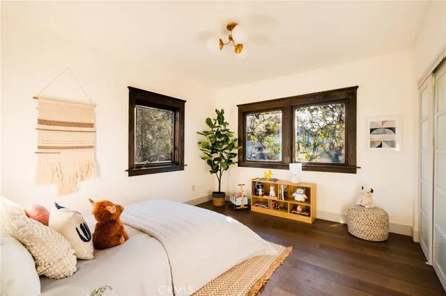 a side view of a house with a yard