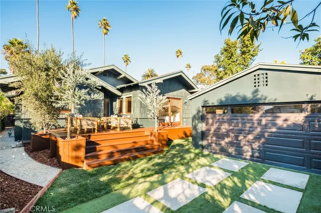 a view of livingroom with furniture and staircase