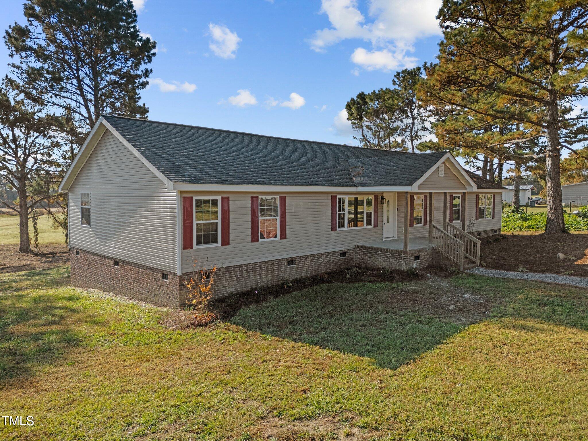 95 Floyd Road Louisburg, NC 27549 - Photo 3 of 38 3-web-or-mls-DJI_20241028101436_0119_D