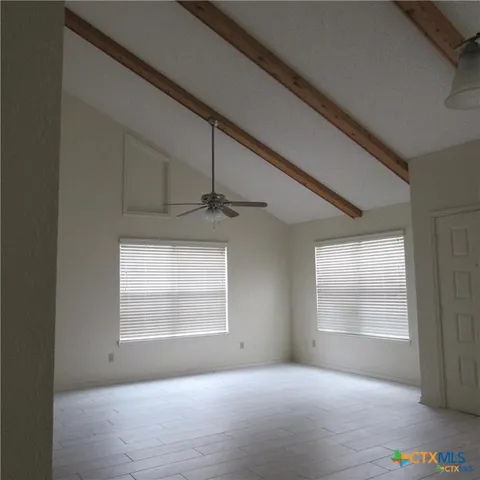 a view of a livingroom with furniture