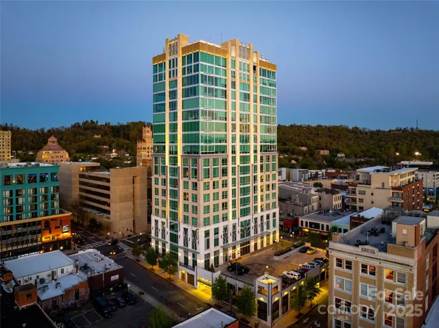 a view of a city with tall buildings