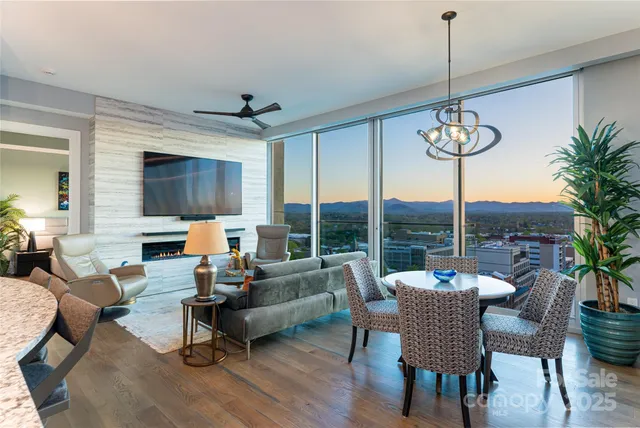 a large kitchen with a table and chairs