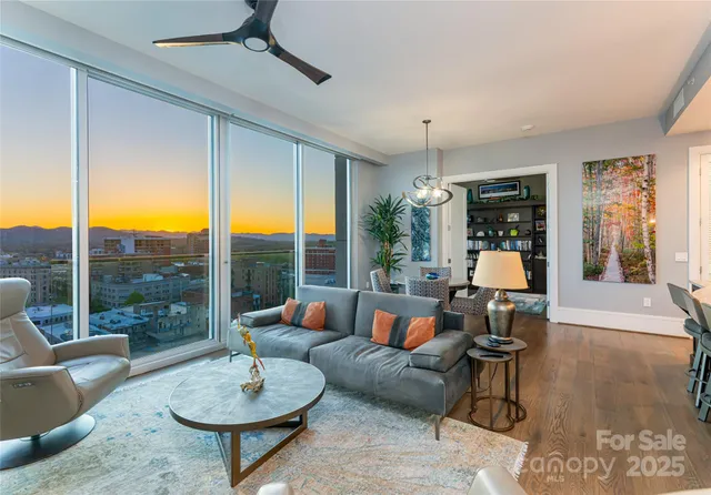 a kitchen with stainless steel appliances a sink stove and refrigerator