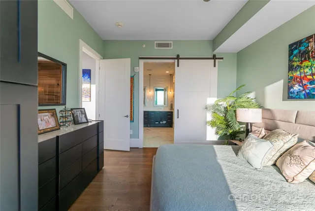 a bathroom with a shower and a sink