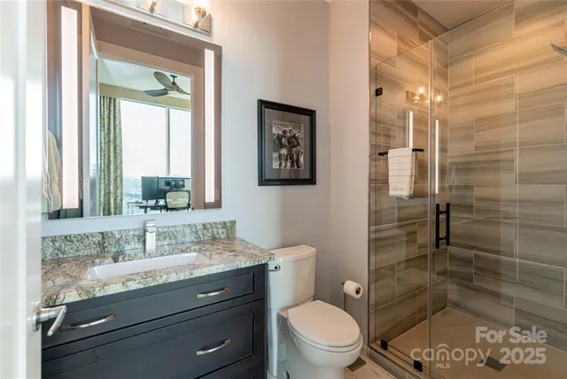 a dining table with chairs and window