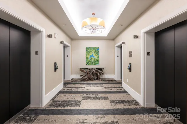 a large kitchen with lots of counter space and dining table