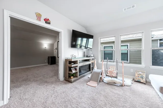 a view of livingroom with furniture and windows