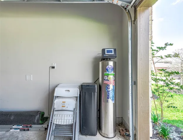 a view of a lake with houses in the back