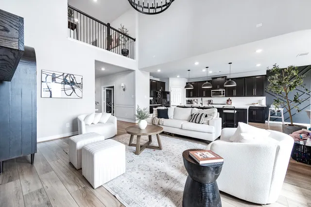 a living room with furniture and a table