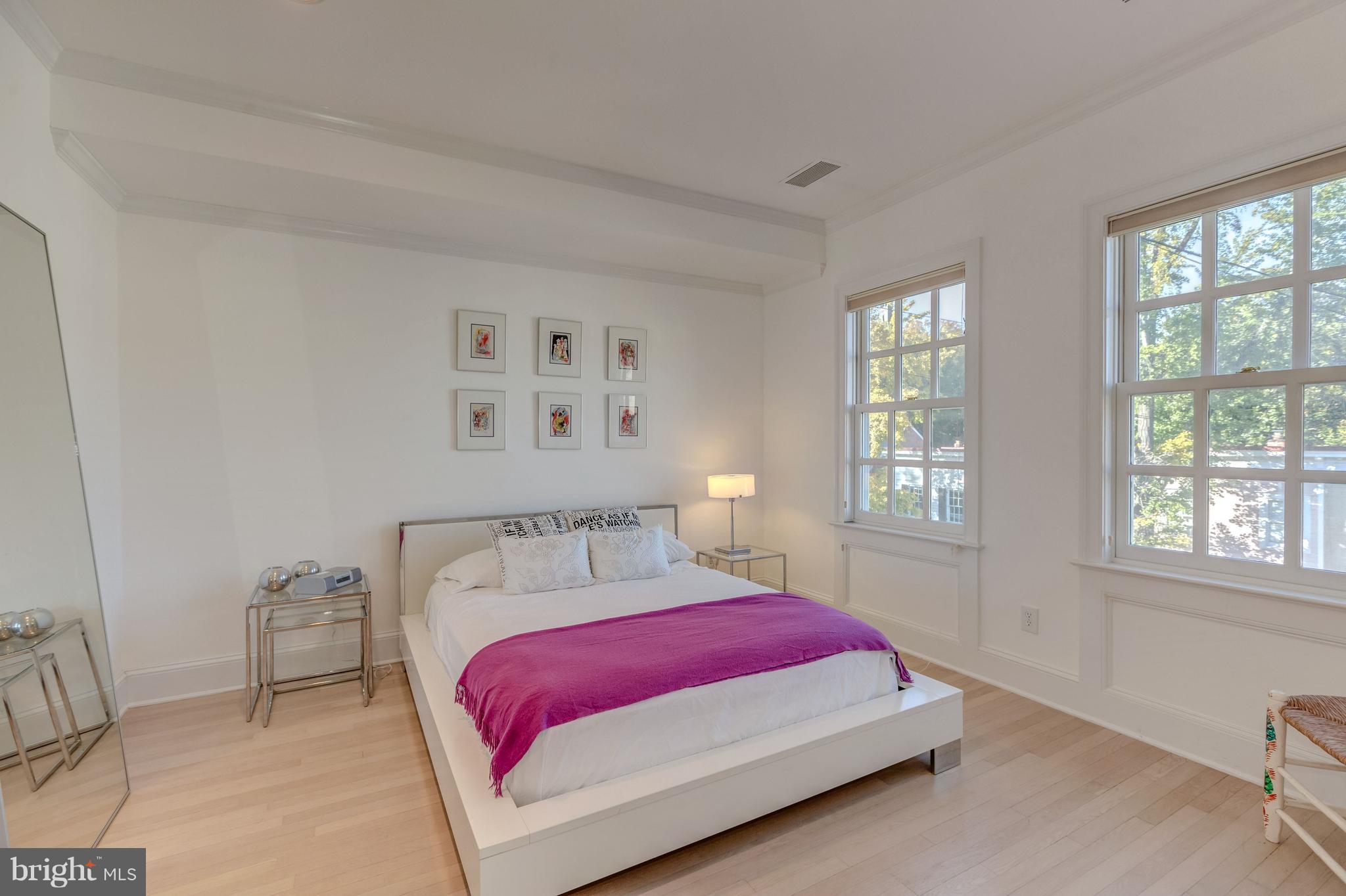 3620 Prospect Street Northwest Washington, DC 20007 - Photo 19 of 23 a bedroom with a bed and a window