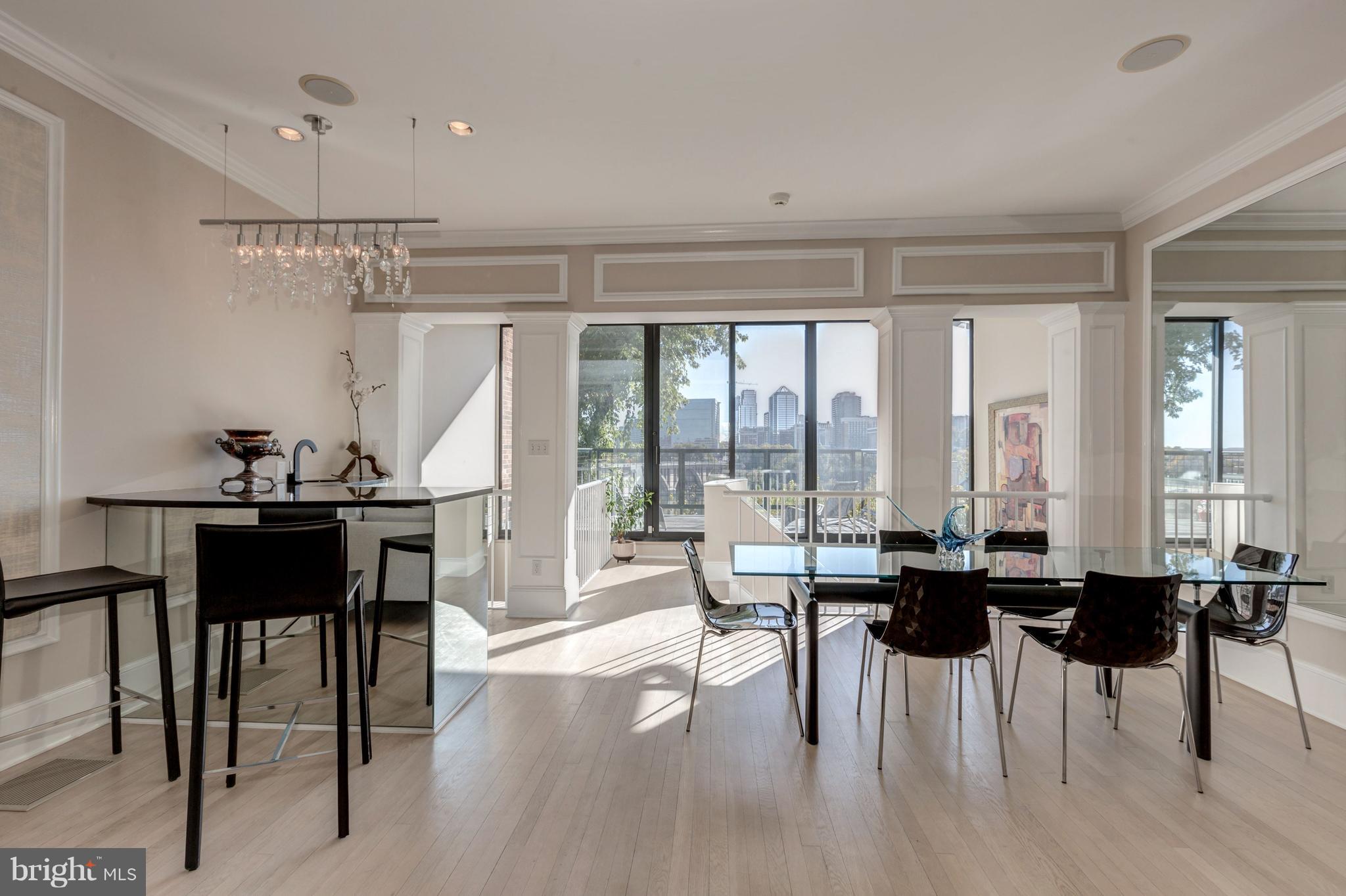 3620 Prospect Street Northwest Washington, DC 20007 - Photo 7 of 23 a living room with furniture a large window and a table