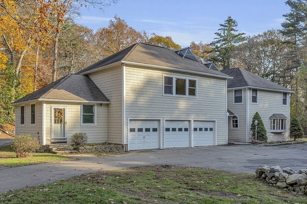 15 Stagecoach Road Topsfield, MA 01983 - Photo 2 of 40 front view of a house with a yard