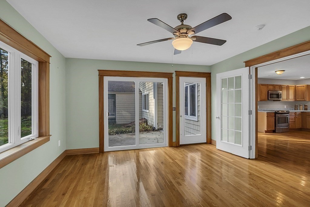 15 Stagecoach Road Topsfield, MA 01983 - Photo 32 of 40 a view of an empty room with wooden floor and a window
