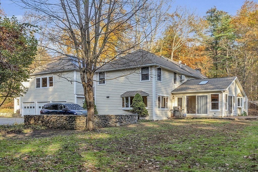 15 Stagecoach Road Topsfield, MA 01983 - Photo 36 of 40 a front view of a house with a yard