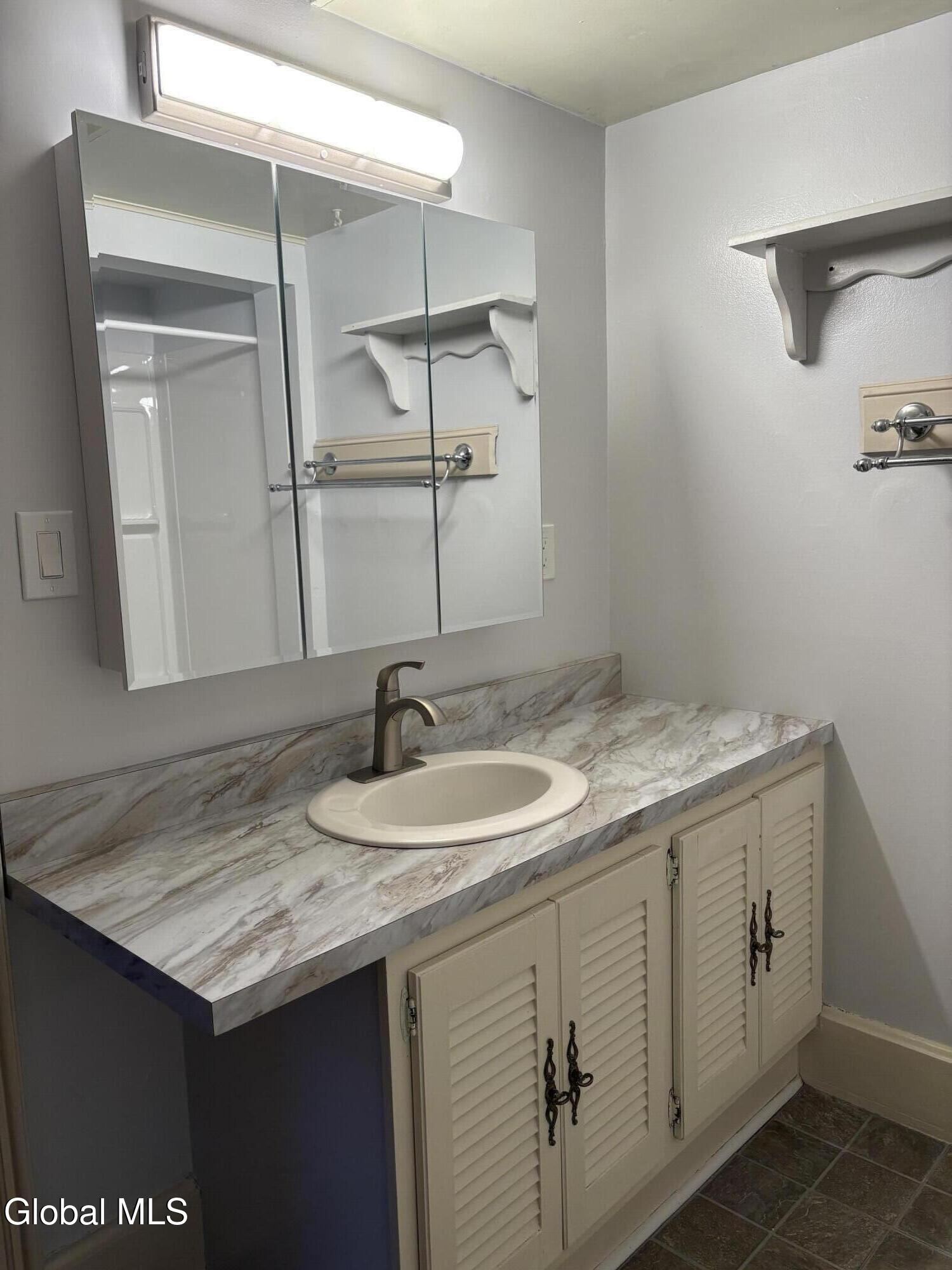 24 George Street Cohoes, NY 12047 - Photo 17 of 20 Bathroom Sink