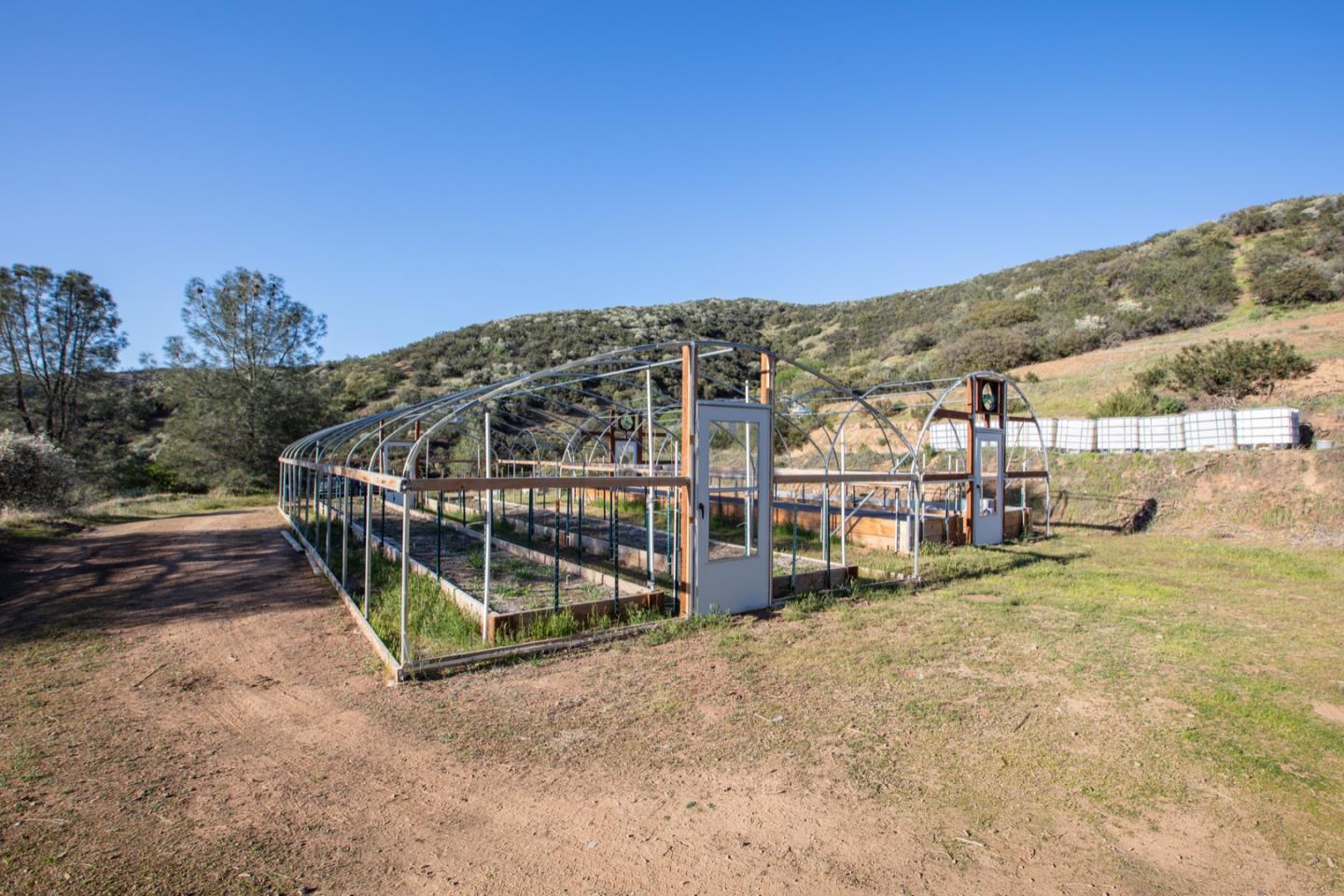 51541 Mines Road Livermore, CA 94550 - Photo 20 of 40 a view of a house with a yard