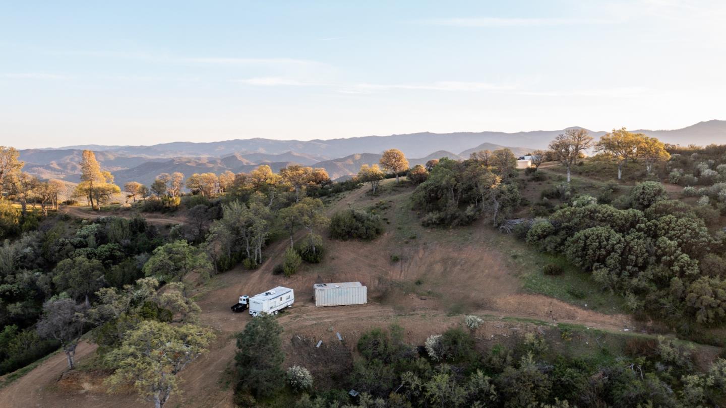 51541 Mines Road Livermore, CA 94550 - Photo 40 of 40 an aerial view of green landscape with trees houses and mountain view