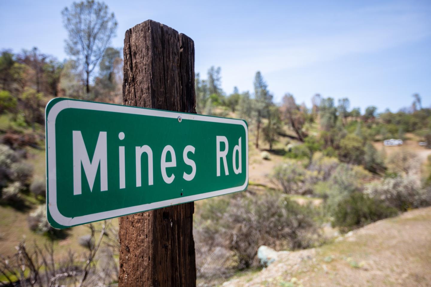 51541 Mines Road Livermore, CA 94550 - Photo 5 of 40 a sign on the side of a road