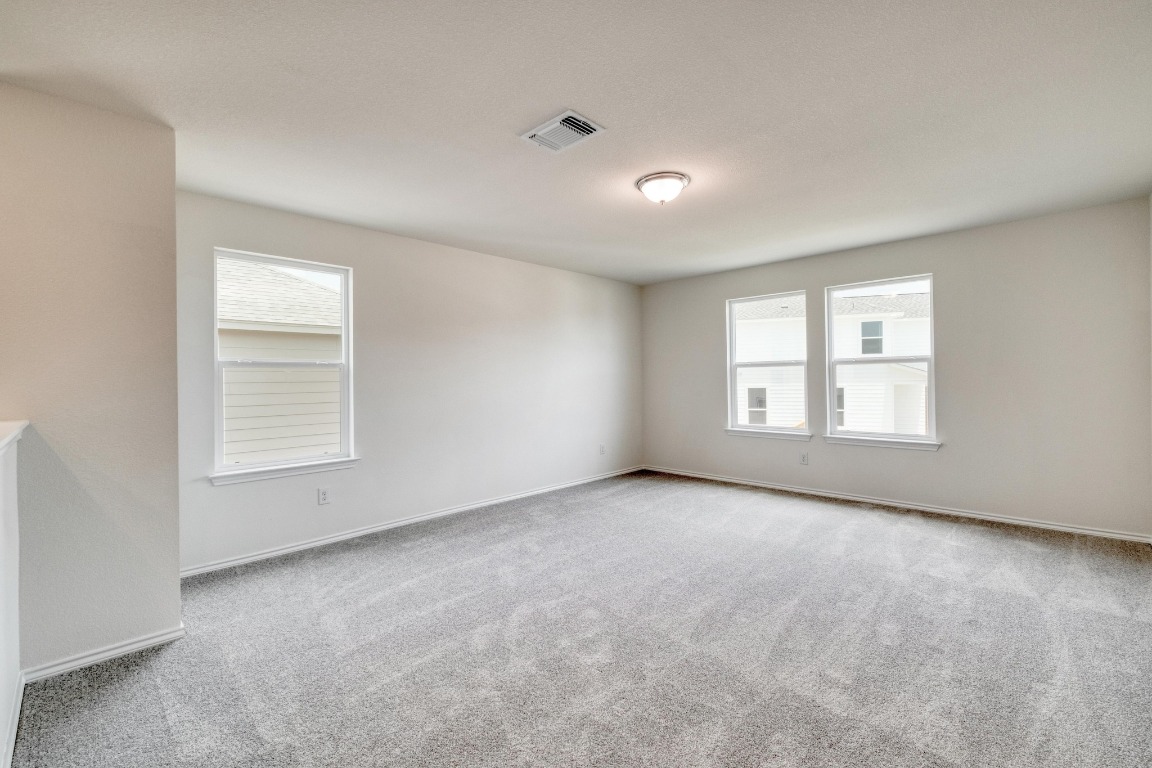 800 Yellow Ribbon Trail Jarrell, TX 76537 - Photo 17 of 32 an empty room with a window