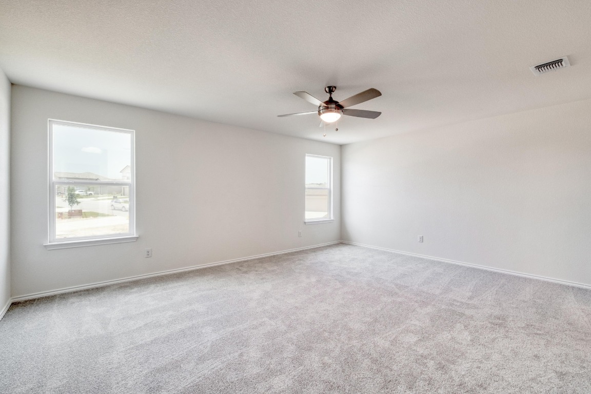 800 Yellow Ribbon Trail Jarrell, TX 76537 - Photo 19 of 32 an empty room with a window