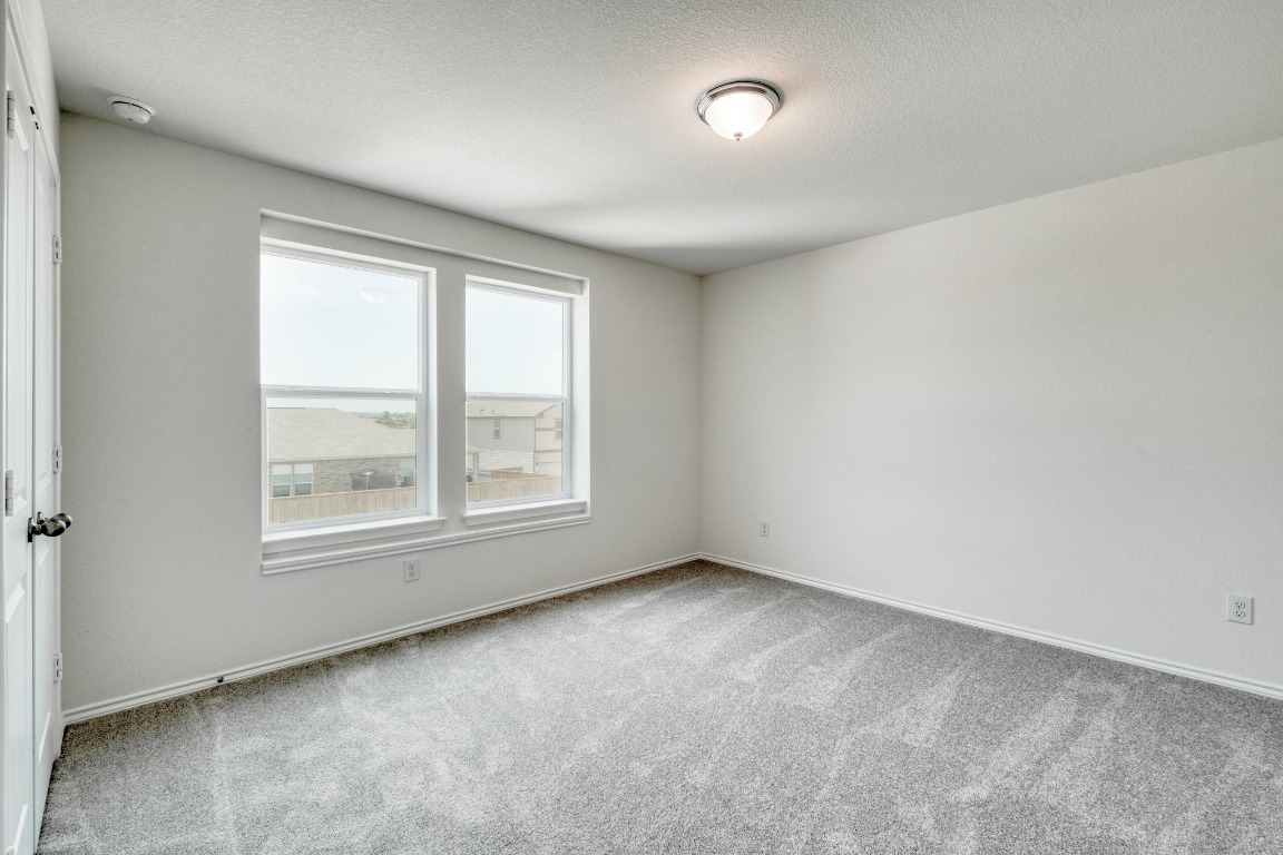 800 Yellow Ribbon Trail Jarrell, TX 76537 - Photo 26 of 32 an empty room with a window