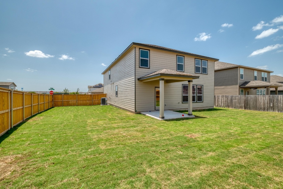 800 Yellow Ribbon Trail Jarrell, TX 76537 - Photo 29 of 32 a view of a backyard of the house