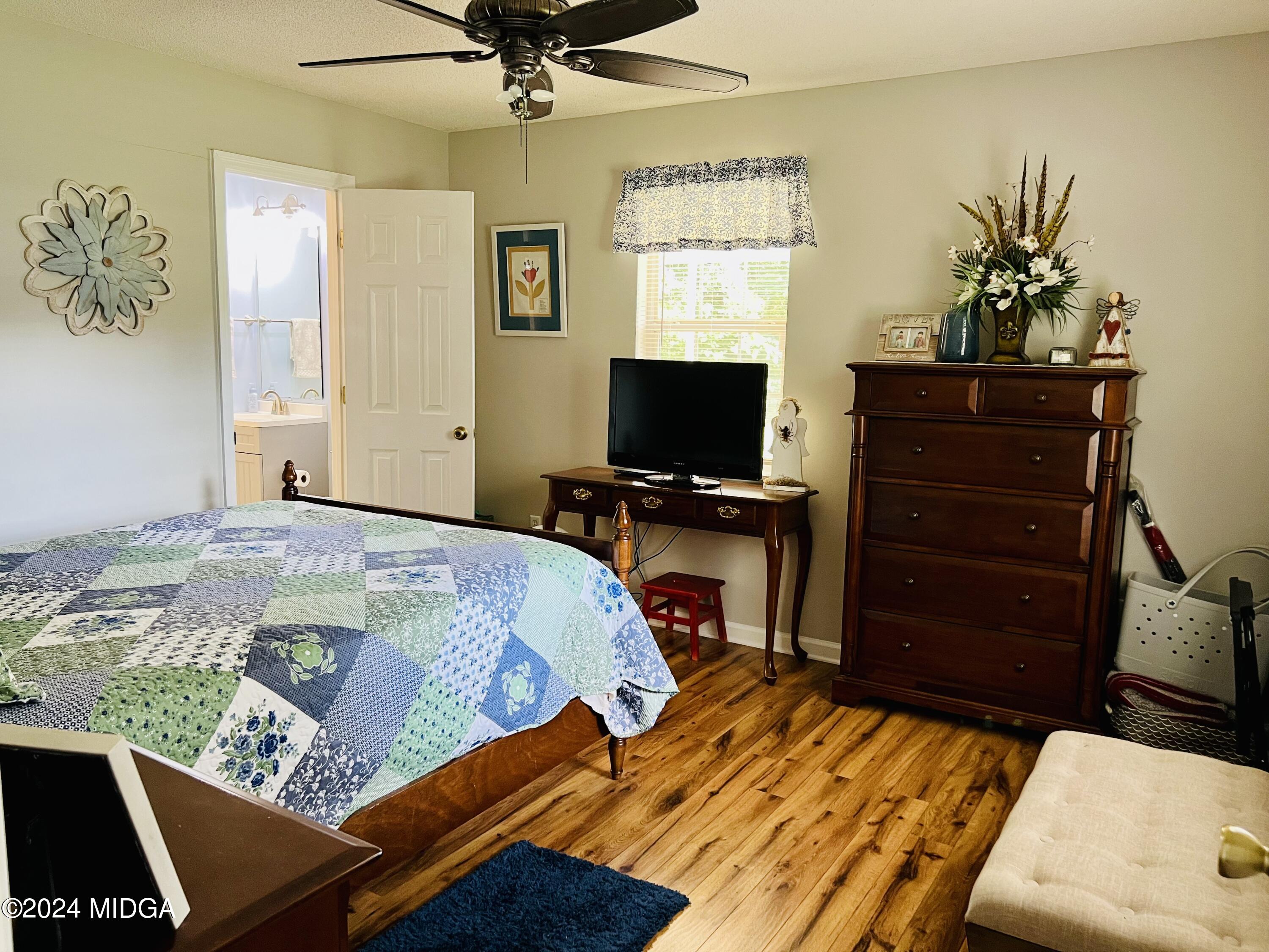 25 Ruby Road Jackson, GA 30233 - Photo 16 of 29 a bedroom with a bed and furniture