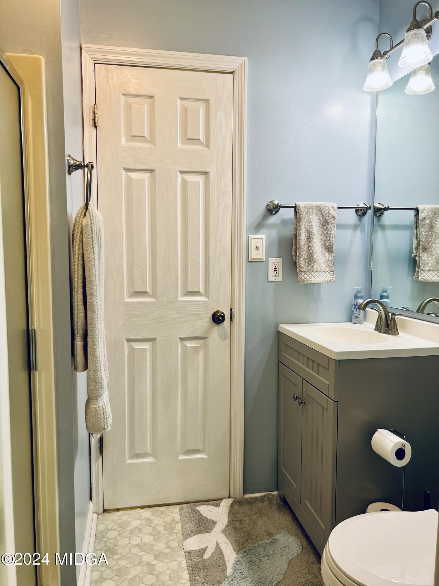 25 Ruby Road Jackson, GA 30233 - Photo 18 of 29 a bathroom with a sink toilet and shower