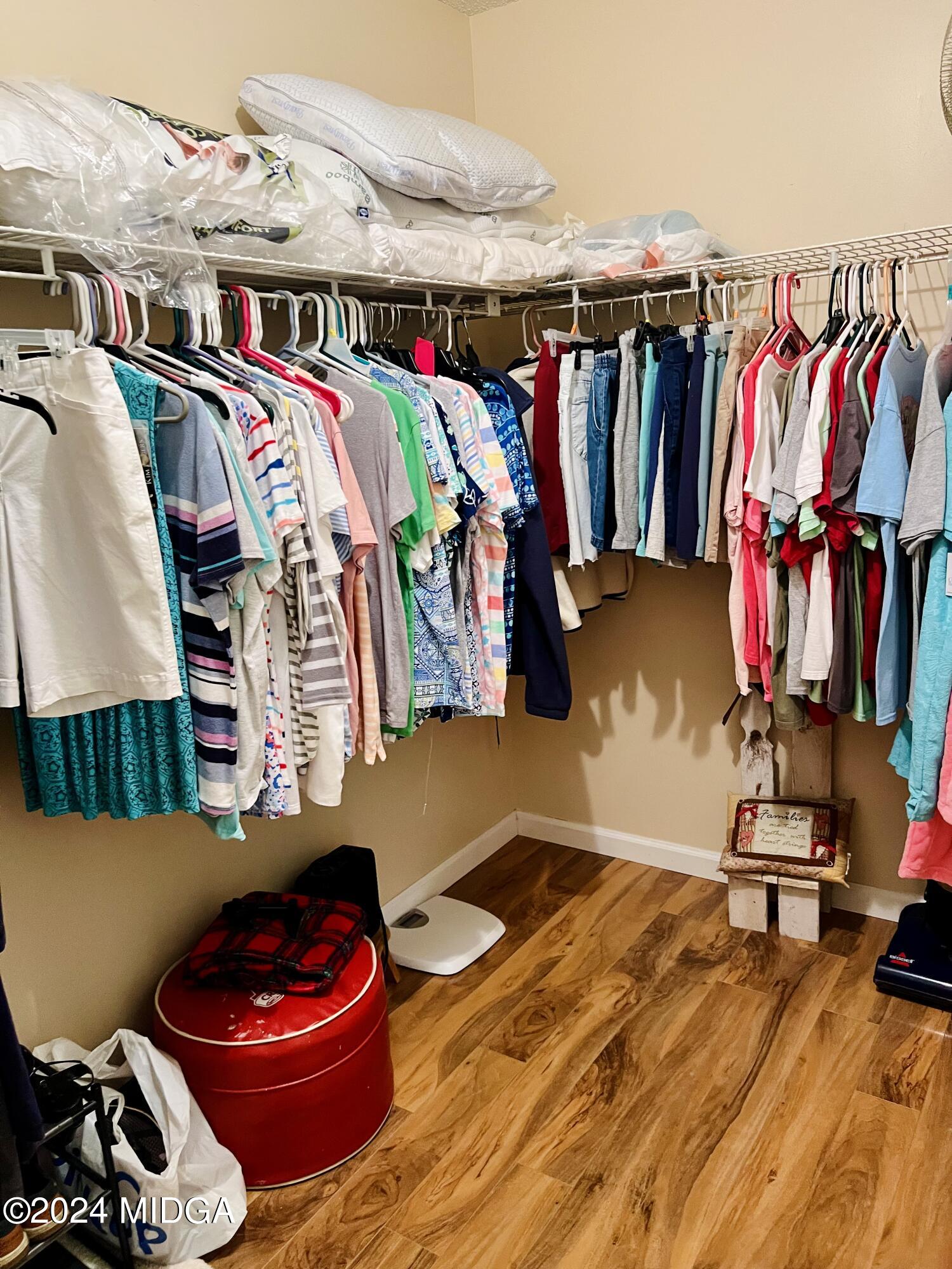 25 Ruby Road Jackson, GA 30233 - Photo 22 of 29 a view of walk in closet with clothes and shoes