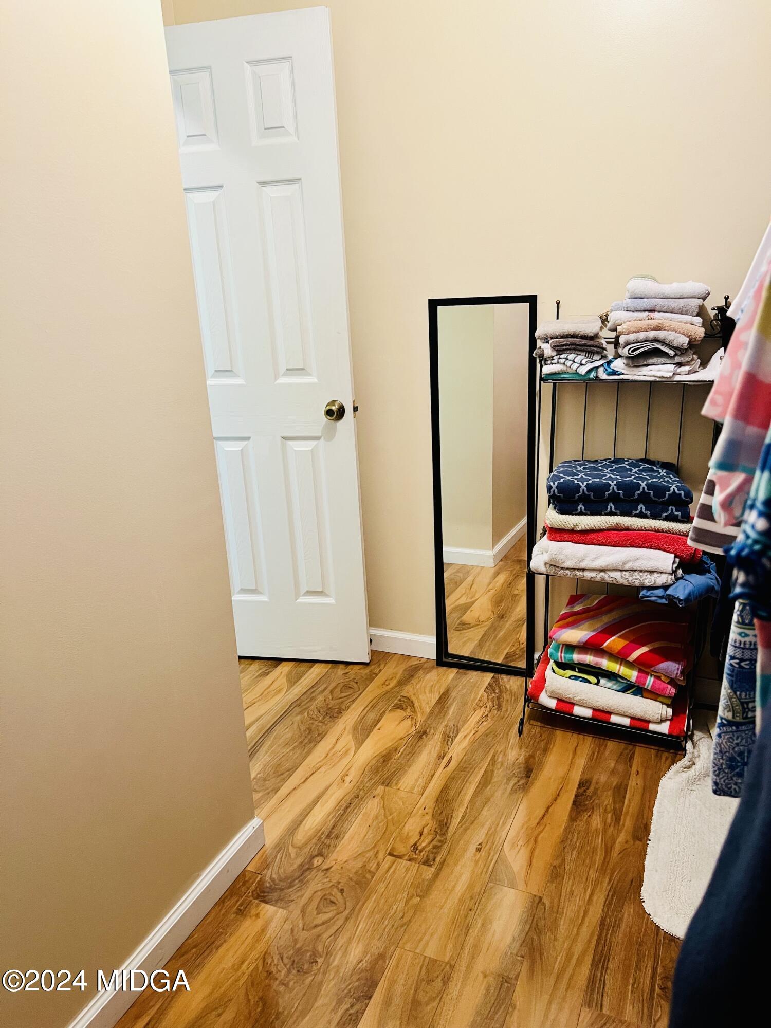 25 Ruby Road Jackson, GA 30233 - Photo 23 of 29 a bedroom with a bed and a table in it